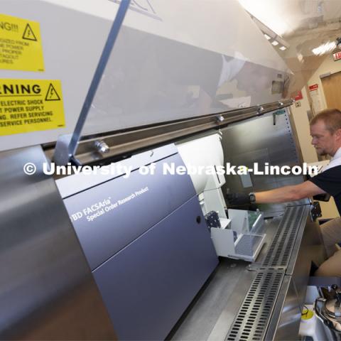 Flow Cytometry Service Center Manager, Dirk Anderson works with samples in a flow Cytometry sorter in the Morrison Center for Virology. Nebraska Center for Biotechnology. June 25, 2021. Photo by Craig Chandler / University Communication.