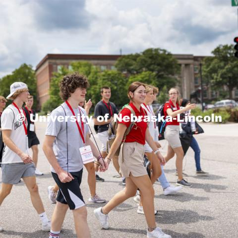 A New Student Enrollment tour group crosses campus at 14th and Vine streets. New Student Enrollment tours on campus. June 30, 2021. Photo by Craig Chandler / University Communication.