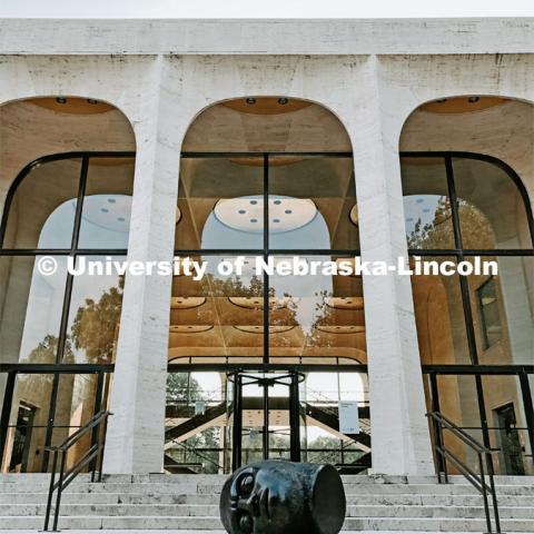 The Fallen Dreamer head sculpture lays on the front steps of the Sheldon Memorial Art Gallery on City Campus. July 21, 2021. Photo by Katie Black / University Communication.