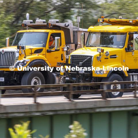 A Nebraska Department of Transportation truck drives across the aging Platte River Bridge as sensors record the movement and vibrations of the bridge. Trucks drove across the bridge singularly and in unison numerous times at varying speeds so the sensors could collect data for each of the runs. NOBL, the Nebraska Outdoor Bridge Lab as part of the College of Engineering is turning two bridge sites (for a total of three bridges) into a national research and educational facility for bridge health and testing. This bridge is across the Platte River on Highway 92 between Yutan and Omaha. August 9, 2021. Photo by Craig Chandler / University Communication.