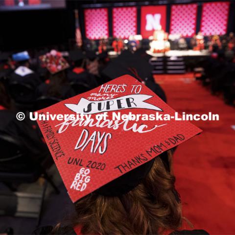 Grace Billig decorated her mortar board to reflect the day. Undergraduate Commencement at Pinnacle Bank Arena. August 14, 2021. Photo by Craig Chandler / University Communication.