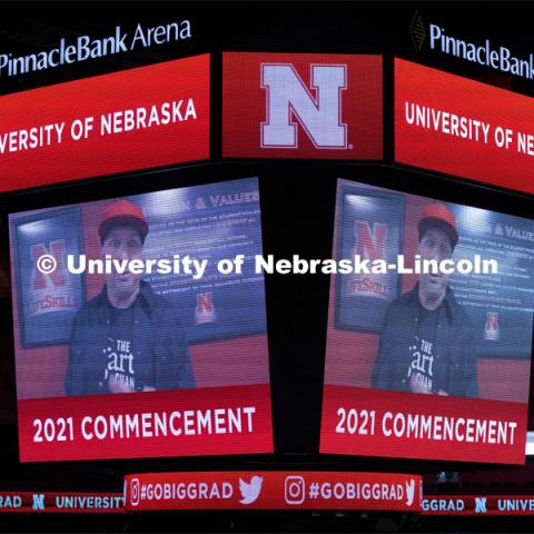 Country singer, Garth Brooks delivers a message to the graduates on the video screen. Undergraduate Commencement at Pinnacle Bank Arena. August 14, 2021. Photo by Craig Chandler / University Communication.