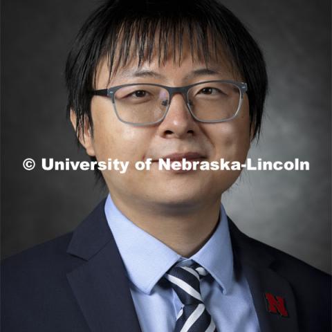 Studio portrait of Yifan Gong, Assistant Professor, Economics. 2021 New Faculty Orientation. August 18, 2021. Photo by Craig Chandler / University Communication.