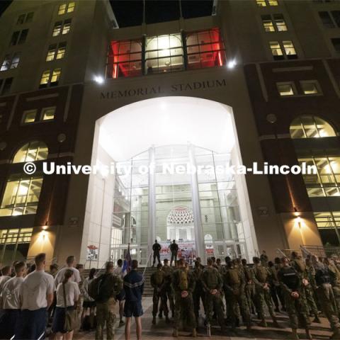 UNL ROTC cadets and Lincoln first responders stand in formation on the east stadium steps to listen to comments before the run. The cadets ran the steps of Memorial Stadium to honor those who died on 9/11. Each cadet ran more than 2,000 steps. September 9, 2021. Photo by Craig Chandler / University Communication.