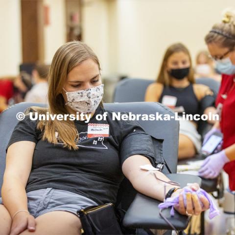 Michaela Aulner, a nursing student, from Omaha, donates Tuesday. Homecoming week blood drive in Nebraska Union. September 28, 2021. Photo by Craig Chandler / University Communication.