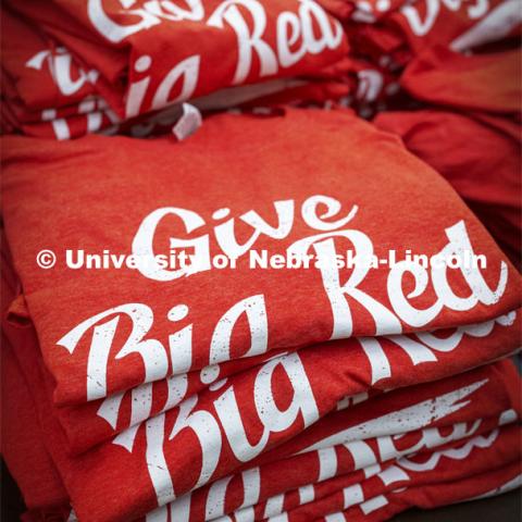 A stack of t-shirts await blood donars. Homecoming week blood drive in Nebraska Union. September 28, 2021. Photo by Craig Chandler / University Communication.