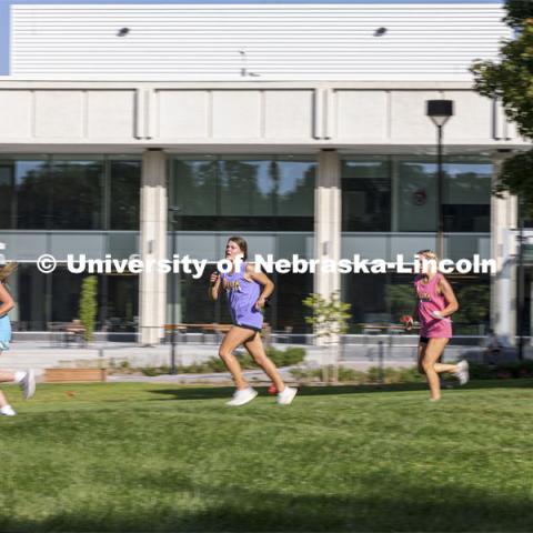 The Delta Gamma team races past the Dinsdale Commons Learning Center en route to solving their next clue. Homecoming Traditions Race. The Traditions Race will consist of clues leading to 10-15 traditions around east campus, and the first three teams to find every tradition will be declared winners. September 28, 2021. Photo by Craig Chandler / University Communication.