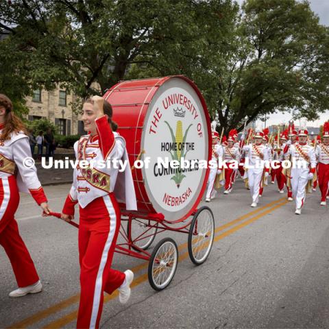 The restored Cornhusker Marching Band base drum leads the band down R Street Friday night.  The five-foot diameter drum, stand and wheels have been restored with a new drum cover. Homecoming Parade and Cornstalk Festival. October 1, 2021. Photo by Craig Chandler / University Communication.