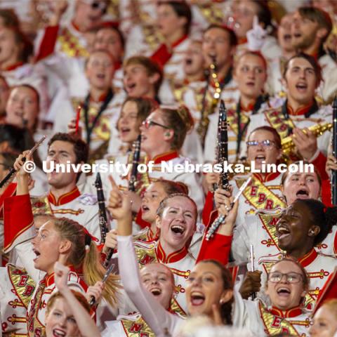 The Cornhusker Marching Band is in the stands cheering on the Husker Football team. Nebraska vs Northwestern University homecoming game. October 2, 2021. Photo by Craig Chandler / University Communication.