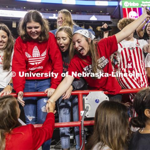 Friends of Leigh Jahnke of West Point congratulate her on being named homecoming royalty at the University of Nebraska–Lincoln. Nebraska vs Northwestern University homecoming game. October 2, 2021. Photo by Craig Chandler / University Communication.