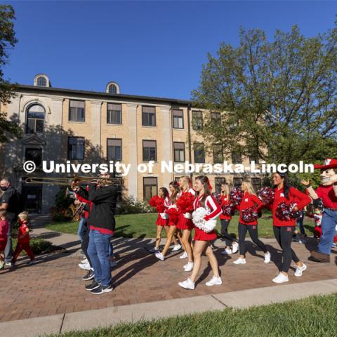 To celebrate Campus Childcare Centers Week at the Ruth Staples Child Development Lab, Herbie Husker, the children, teachers, sprit squad members and band members had a parade from the flagpole by Chase Hall to Ag Hall. October 4, 2021. Photo by Craig Chandler / University Communication.