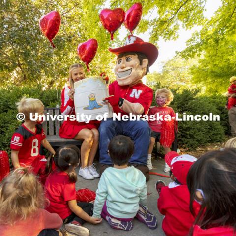 To celebrate Campus Childcare Centers Week at the Ruth Staples Child Development Lab, Herbie Husker, the children, teachers, sprit squad members and band members had a parade from the flagpole by Chase Hall to Ag Hall. October 4, 2021. Photo by Craig Chandler / University Communication.
