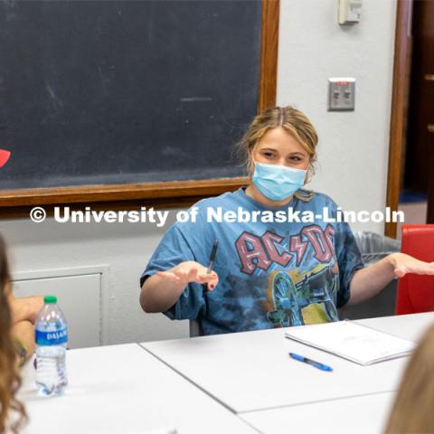 Hannah Sunderman, Program Director, NHRI Leadership Mentoring and Professor of Practice, works with her ALEC 102 Interpersonal Skills for Leadership class. They were doing a values game.October 7, 2021. Photo by Abby Durheim for University Communication.