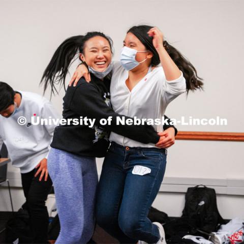 Tram Ngo and Theresa Tran Le celebrate as the Vietnamese Student Association (Recognized Student Organization) plays their own version of Squid Games during their meeting. October 21, 2021. Photo by Jonah Tran / University Communication.