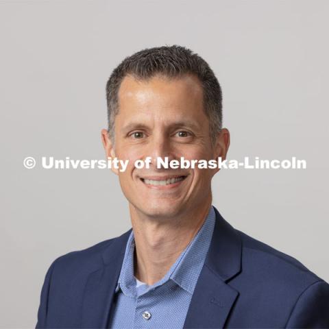 Studio portrait of Anthony Bushard, Associate Professor of Music History, Glenn Korf School of Music, Hixson-Lied College of Fine and Performing Arts. October 28, 2021. Photo by Craig Chandler / University Communication.