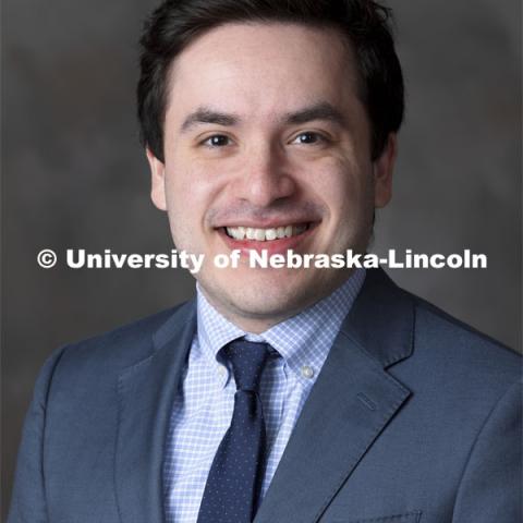 Studio portrait of Edgar Reynaga, Nebraska University Foundation Assistant Director of Marketing and Annual Campaigns. November 3, 2021. Photo by Craig Chandler / University Communication.