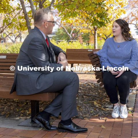 Chancellor Ronnie Green and  Maddie Swanson talk over their first-gen college experiences. November 4, 2021. Photo by Craig Chandler / University Communication