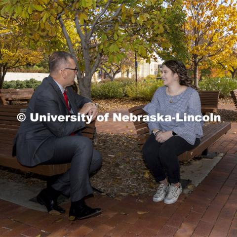 Chancellor Ronnie Green and  Maddie Swanson talk over their first-gen college experiences. November 4, 2021. Photo by Craig Chandler / University Communication