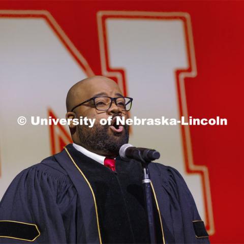 Alfonzo Cooper, Jr., a 2020 music doctorate, sings the National Anthem. Graduate Commencement at Pinnacle Bank Arena. December 17, 2021. Photo by Craig Chandler / University Communication.