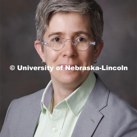 Studio portrait of Scout Calvert, Associate Professor for University Libraries. January 5, 2022. Photo by Craig Chandler / University Communication.