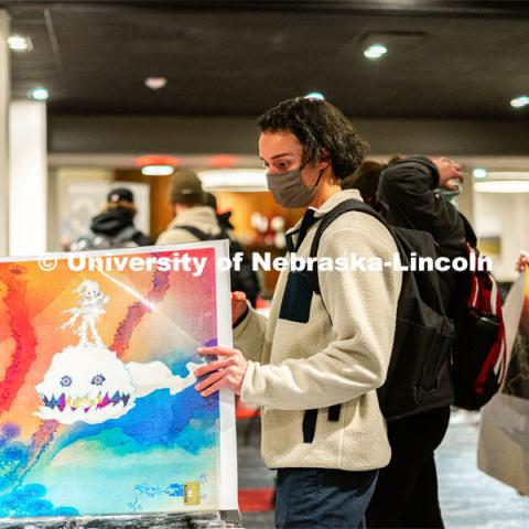 Poster sale in the Nebraska Union. January 25, 2022. Photo by Jonah Tran / University Communication.