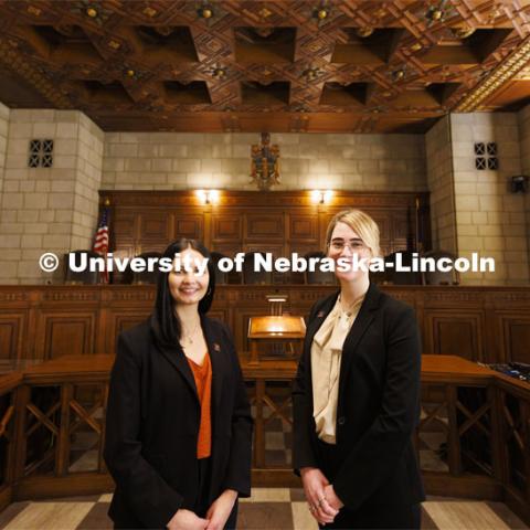 Nebraska Law students Jayden Barth (left) and Rachel Tomlinson Dick delivered oral arguments in the Nebraska Supreme Court. Both are third-year students mentored by Law Professor Ryan Sullivan. They are pictured in the Supreme Court chambers. February 4, 2022. Photo by Craig Chandler / University Communication.