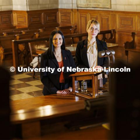 Nebraska Law students Jayden Barth (left) and Rachel Tomlinson Dick delivered oral arguments in the Nebraska Supreme Court. Both are third-year students mentored by Law Professor Ryan Sullivan. They are pictured in the Supreme Court chambers. February 4, 2022. Photo by Craig Chandler / University Communication.