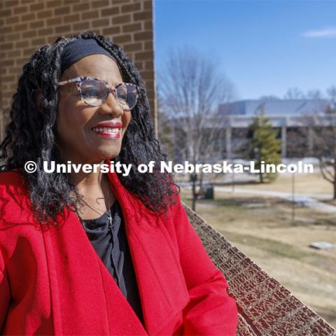 Nebraska's Reshell Ray’s passion for supporting students shines in her work assisting with campus event planning through the Office of Student Leadership, Involvement and Community Engagement. Ray is pictured looking out from the Nebraska East Union balcony outside the third-floor offices. February 18, 2022. Photo by Craig Chandler / University Communication.