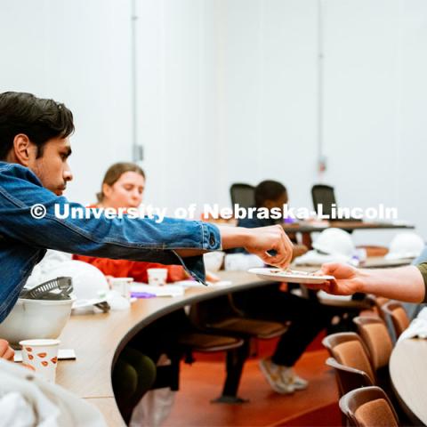 Students taste sausages with varying levels of salt to learn how salt affects taste. UNL Meat Science club had a Sausage Making 101 course in the Animal Science Complex. February 28, 2022. Photo by Jonah Tran / University Communication.