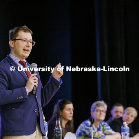 Lukasz Niparko, a graduate student in political science, talks with the audience. Stand With Ukraine! panel discussion in the Nebraska Union ballroom Tuesday afternoon. March 1, 2022. Photo by Craig Chandler / University Communication.