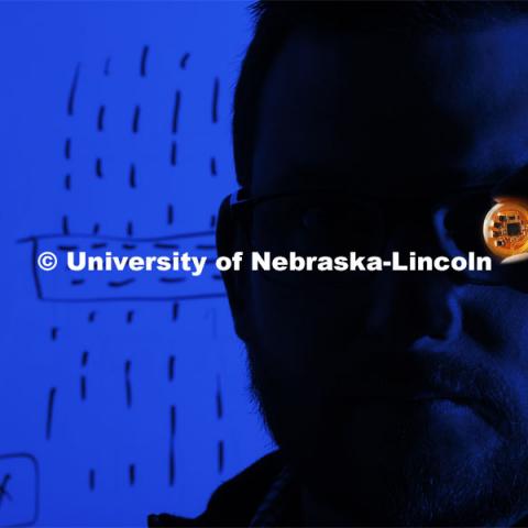 Eric Markvicka, Assistant Professor in Mechanical and Materials Engineering, has developed the smart nose. The wearable sensor can “smell” and diagnose the wearer’s medical condition. Nebraska Engineering researchers present, "Wireless, Battery Free Wearable Electronic Nose," March 10, 2022. Photo by Craig Chandler / University Communication.