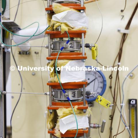 Distillation tower in Hunter Flodman’s UO Lab. College of Engineering photo shoot. March 22, 2022. Photo by Craig Chandler / University Communication.