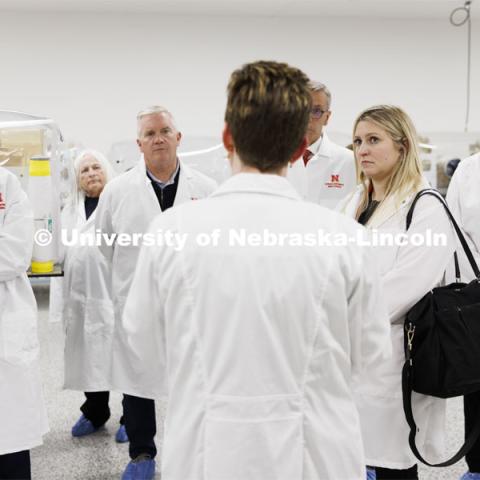 Amanda Ramer-Tait answers questions as the Board of Regents tours the Nebraska Gnotobiotic Mouse Program. From left is Regents Jack Stark, Barbara Weitz, Timothy Clare, Chancellor Ronnie Green, Elizabeth O’Connor and Executive Vice Chancellor Katherine Ankerson. Board of Regents tour of UNL. April 7, 2022. Photo by Craig Chandler / University Communication.