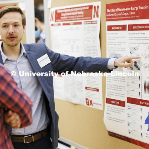 Guilherme Eymael talks about energy transfers during the session. Undergraduate Student Poster Session in the Nebraska Union ballroom as part of Student Research Days. April 11, 2022. Photo by Craig Chandler / University Communication.