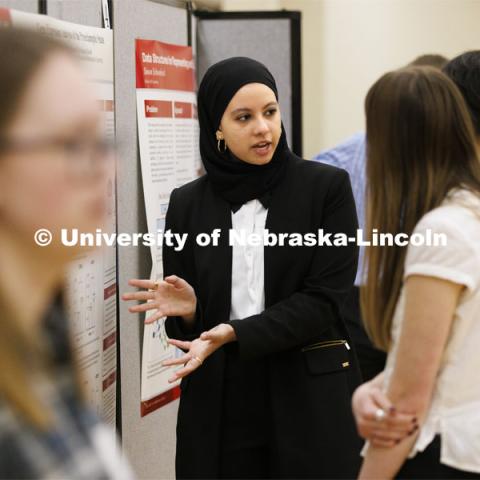 Noha Algahimi talks about her research on gene expression analysis. Undergraduate Student Poster Session in the Nebraska Union ballroom as part of Student Research Days. April 11, 2022. Photo by Craig Chandler / University Communication.