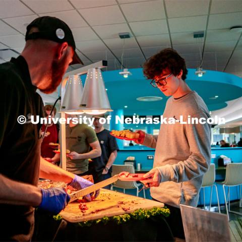 A seemingly never-ending cavalcade of Nebraska beef — all locally grown in Ashland, just 30 minutes from campus — was what was for dinner April 14 at the University of Nebraska–Lincoln’s Cather Dining Center. And the moving menu drew in herds of students, each hoping to graze on some of the best beef the Cornhusker State has to offer. April 14, 2022. Photo by Jonah Tran / University Communication.