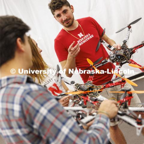 Santiago Giraldo discusses UAVs in the NIMBUS lab. College of Engineering photoshoot in the School of Computing.  April 22, 2022. Photo by Craig Chandler / University Communication.
