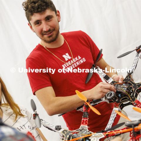 Santiago Giraldo discusses UAVs in the NIMBUS lab. College of Engineering photoshoot in the School of Computing.  April 22, 2022. Photo by Craig Chandler / University Communication.