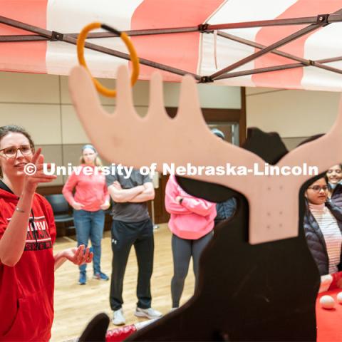 Students play carnival games during the End of Year Bash inside the East Campus Union on Saturday, April 30, 2022, in Lincoln, Nebraska.  Photo by Jordan Opp for University Communication
