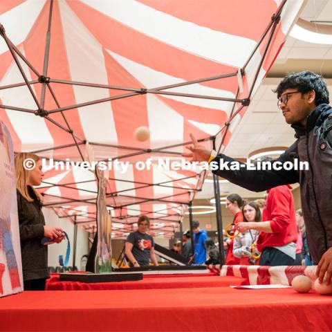 Students play carnival games during the End of Year Bash inside the East Campus Union on Saturday, April 30, 2022, in Lincoln, Nebraska.  Photo by Jordan Opp for University Communication
