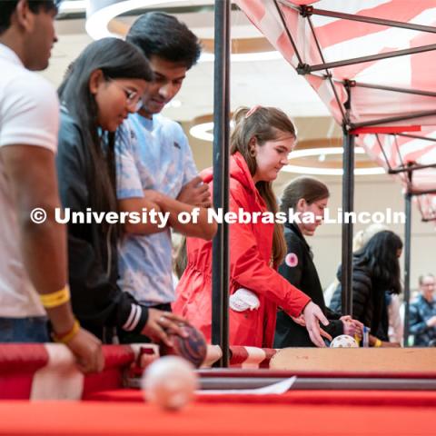 Students play carnival games during the End of Year Bash inside the East Campus Union on Saturday, April 30, 2022, in Lincoln, Nebraska.  Photo by Jordan Opp for University Communication
