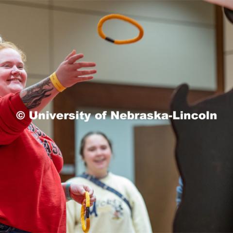 Students play carnival games during the End of Year Bash inside the East Campus Union on Saturday, April 30, 2022, in Lincoln, Nebraska.  Photo by Jordan Opp for University Communication
