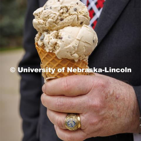 President Ted Carter of the University of Nebraska enjoys an ice cream cone of Carter’s Coffee Crunch, named for the new president. May 4, 2022. Photo by Craig Chandler / University Communication.