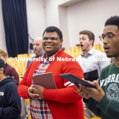 Jayven Brandt sings during Chamber Singers practice in Westbrook Music Hall. ASEM CoCreate story. May 5, 2022. Photo by Craig Chandler / University Communication.