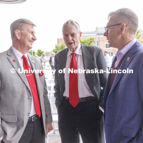 NU President Ted Carter, Former Husker football coach Tom Osborne, and UNL Chancellor Ronnie Green talk following the ribbon cutting. Ribbon cutting for the new Scarlet Hotel in Nebraska Innovation Campus. March 6, 2021. Photo by Craig Chandler / University Communication.