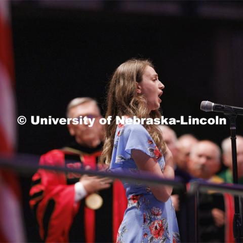 The national anthem is sung during Graduate commencement in Pinnacle Bank Arena. May 13, 2022. Photo by Craig Chandler / University Communication.