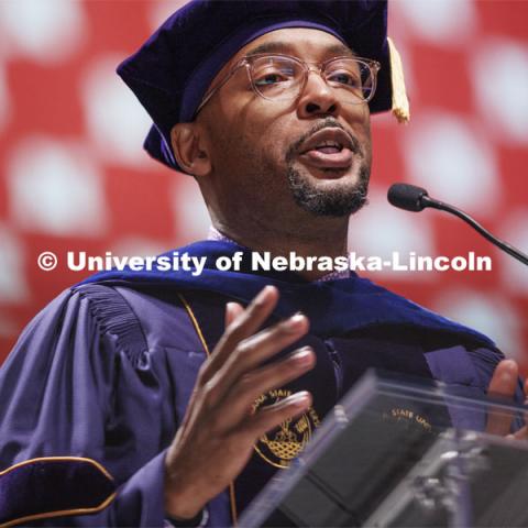 Marco Barker, Vice Chancellor for Diversity and Inclusion, delivers the commencement address. Graduate commencement in Pinnacle Bank Arena. May 13, 2022. Photo by Craig Chandler / University Communication.