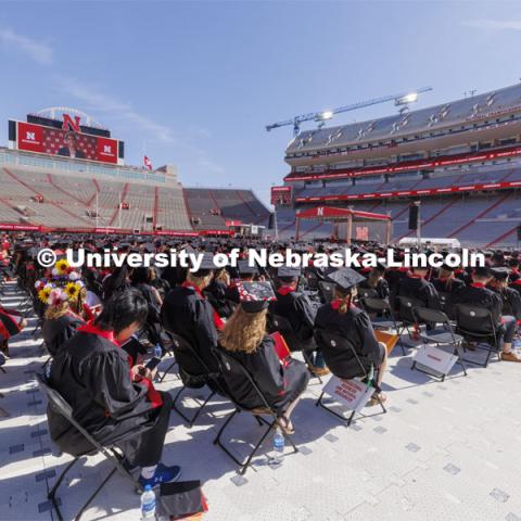 Students are seated at the UNL undergraduate commencement in Memorial Stadium. May 14, 2022. Photo by Craig Chandler / University Communication.