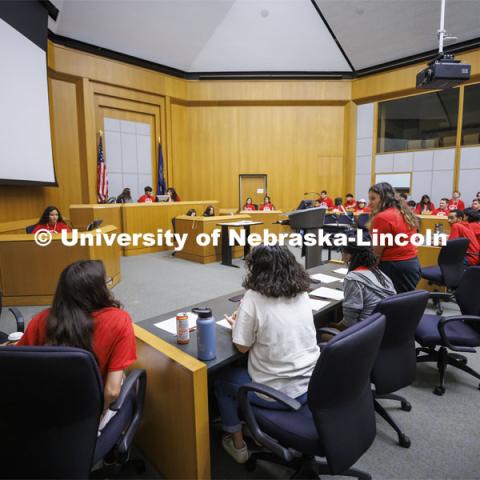 The defense team questions Mama Bear, played by Kyana Rios of Omaha South, during the of trial of Goldilocks vs the Three Bears. NCPA junior and senior high school students participate in a mock trial at Nebraska Law. June 9, 2022. Photo by Craig Chandler / University Communication.