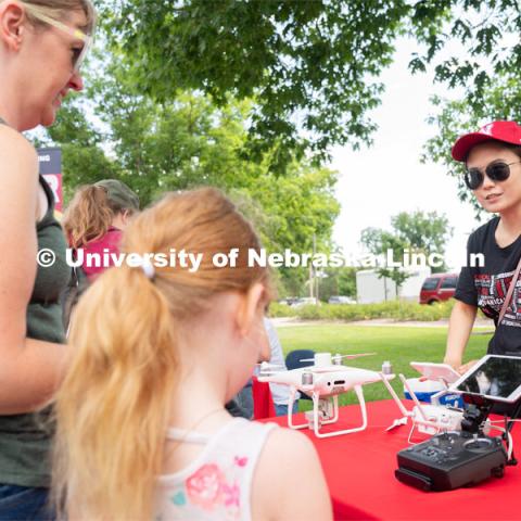 Discovery Day attendees learn about drones. The East Campus Discovery Days and Farmer’s Market at UNL is a fun, family-friendly event for all ages. It’s more than a farmer’s market. It’s more than a science day. Come for the hands-on, science-focused fun. Stay to enjoy live music and food trucks. Shop at our farmer’s market and vendor fair. June 11, 2022. Photo by Jordan Opp / University Communication.